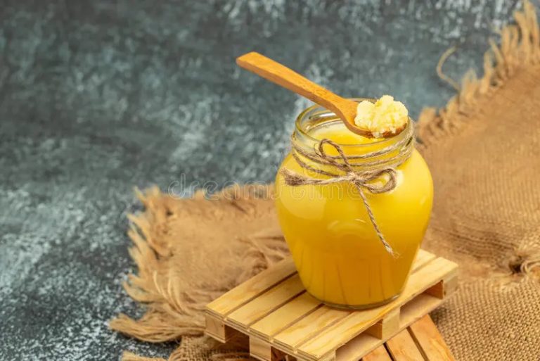 ghee-clarified-butter-cooking-oil-pure-healthy-fat-diet-concept-banner-menu-recipe-place-text-top-view-255665366